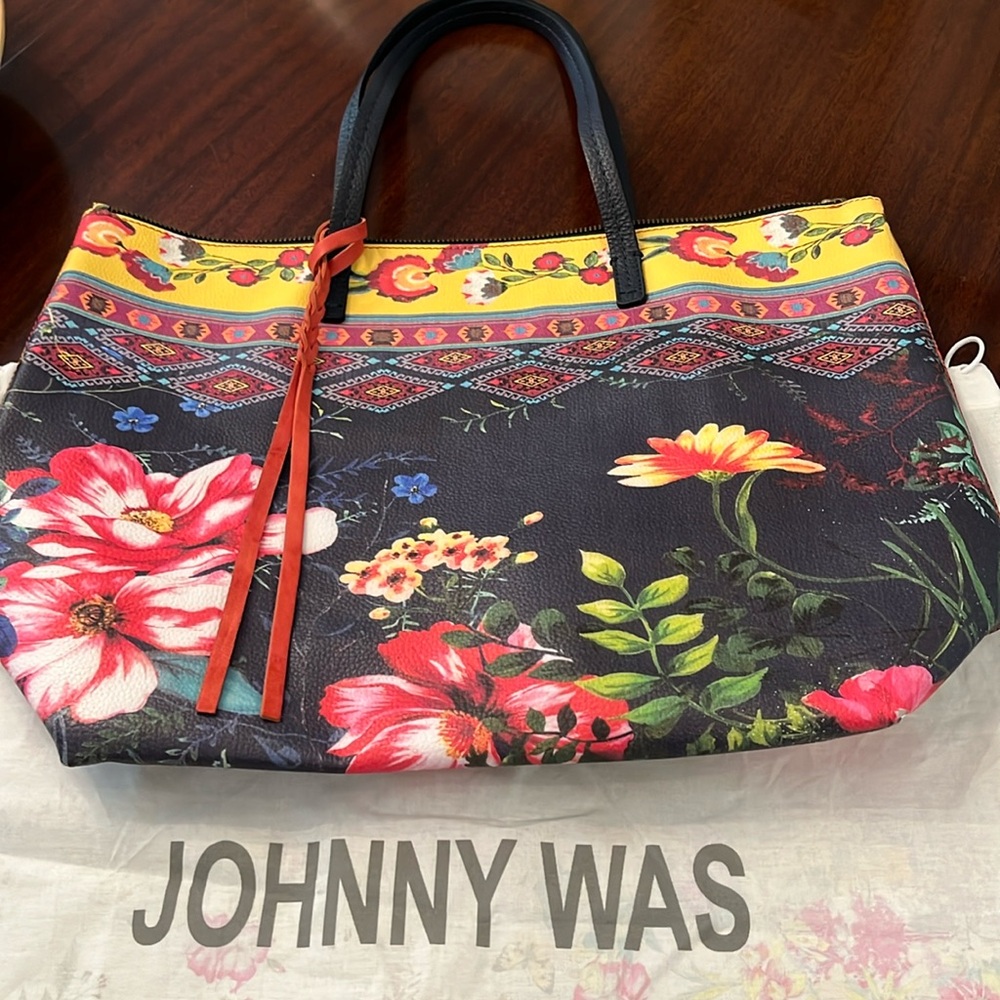 Johnny Was leather BOHO large tote in vibrant colors on an indigo background.